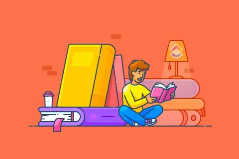 Un joven lee un libro rosa sentado entre grandes libros, buscando inspiración para sus propios libros para empezar a leer adultos.