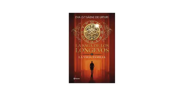 La portada del libro "La saga de los longevos: La vieja familia" muestra un símbolo de infinito y un hombre solitario en un pasillo.